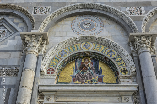 Architectural fragments of Romanesque medieval Roman Catholic Pisa Cathedral at Square of Miracles  Piazza dei Miracoli or Piazza del Duomo   UNESCO World Heritage Site. Pisa  Tuscany  Italy.