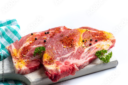 Raw pork meat slice on white background