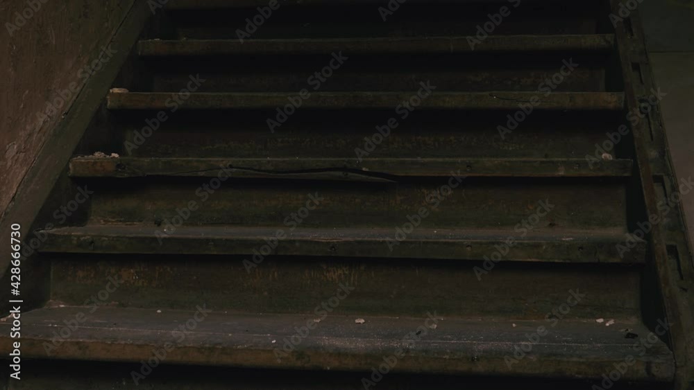 Creepy wooden stairs in abandoned house. Poland Creepy wooden stairs in abandoned house. Poland