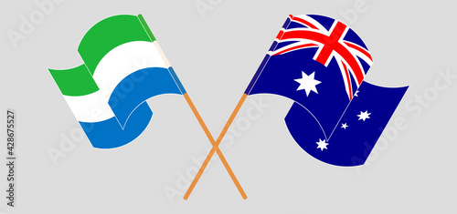 Crossed and waving flags of Sierra Leone and Australia