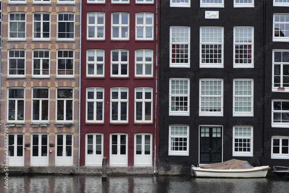 Amsterdam Damrak Canal Building Facades Close Up with Boat