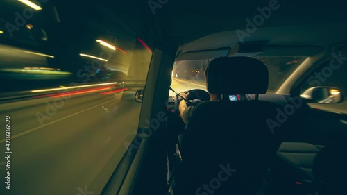 Night hyperlapse inside the car on highway and city traffic