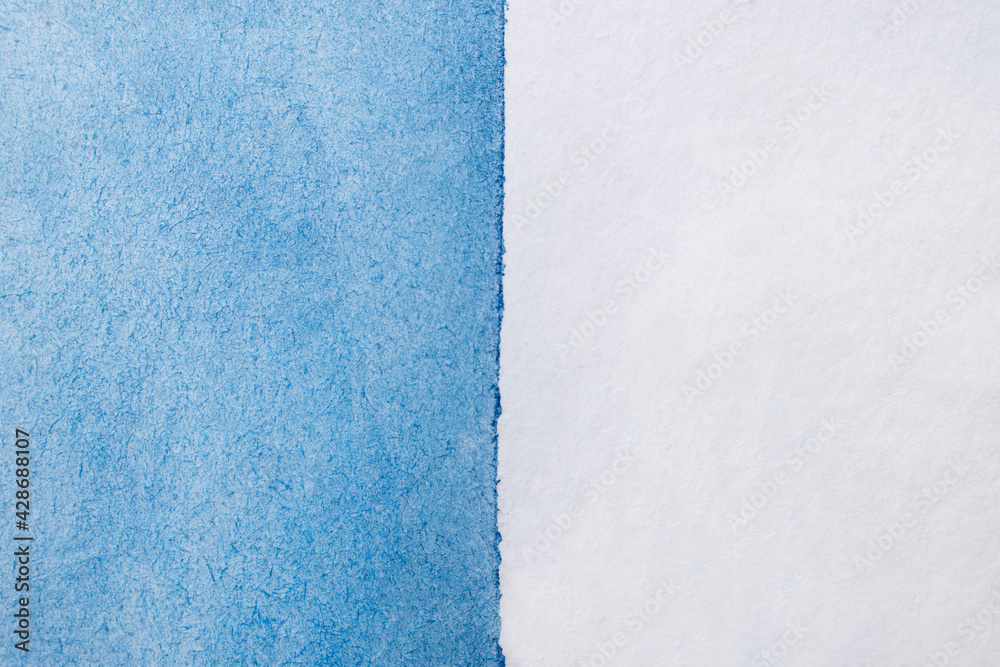 Naklejka premium An abstract hand drawn blue watercolor background