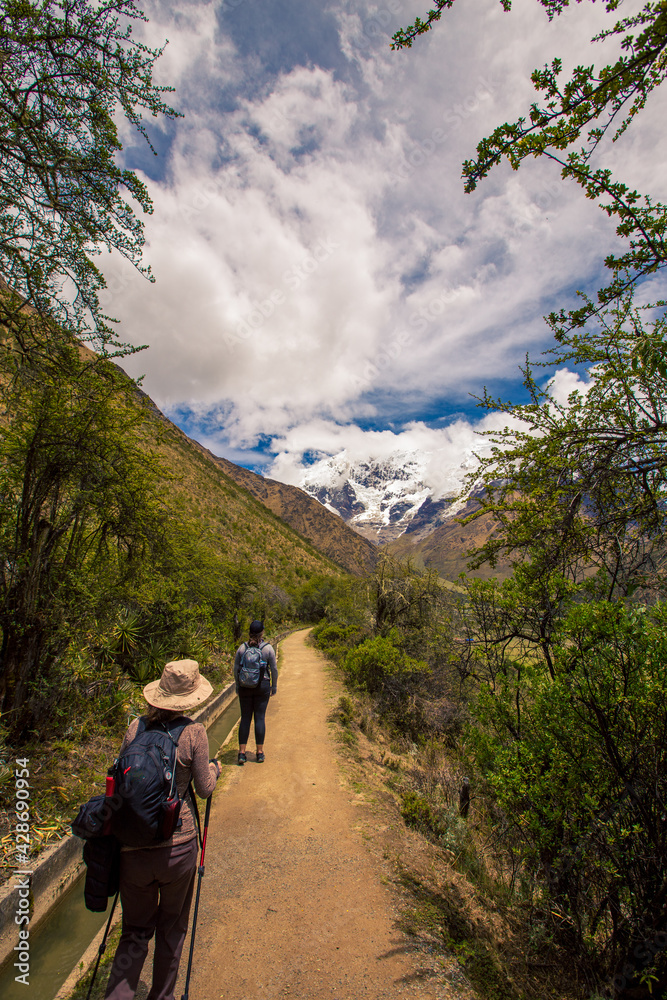 hikers on a trail in Peru