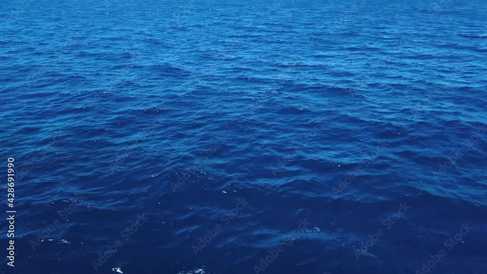 Traveling over Calm Blue Ocean, Background Scene Traveling over Calm Blue Ocean, Background Scene