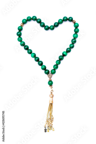 Muslim prayer rosary beads isolated on white background.