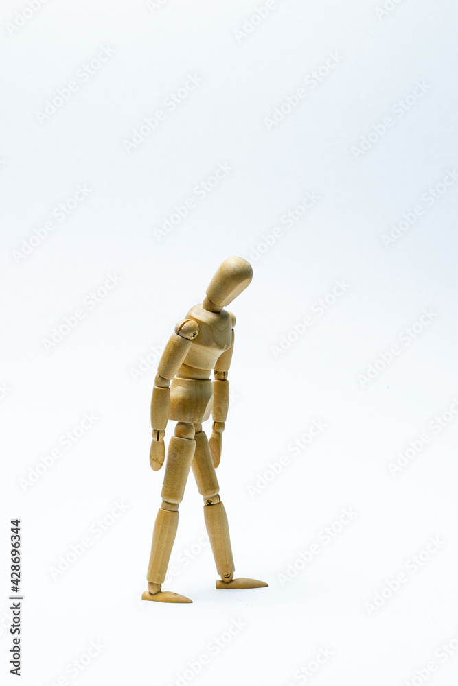 wooden mannequin standing on a white background wooden mannequin standing on a white background