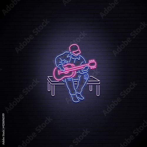 Neon Musician Busking photo