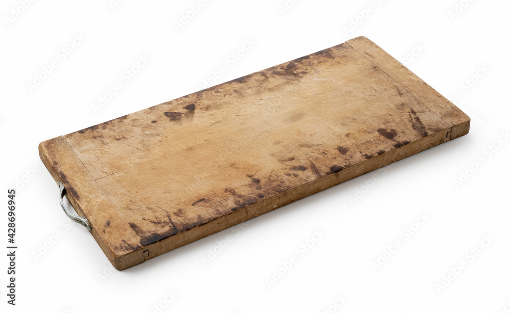 Fototapeta premium A used cutting board on a white background.