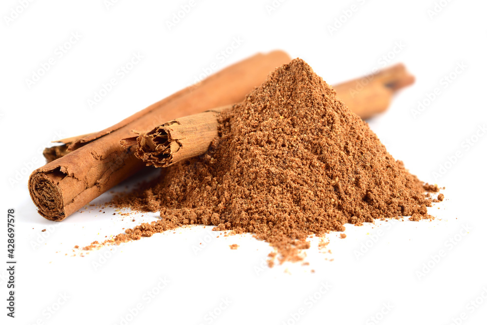 Ceylon Cinnamon or True Cinnamon Powder with added Cane Sugar and Quills (Sticks). Cooking Ingredient. Cinnamomum Verum. Isolated on White. - obrazy, fototapety, plakaty 