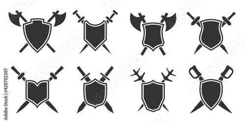 Shield with crossed sword, poleaxe, saber icon set. Medieval weapon heraldic black symbol isolated on white background. Retro outline military logo design. Protection armor, safety guard power sign