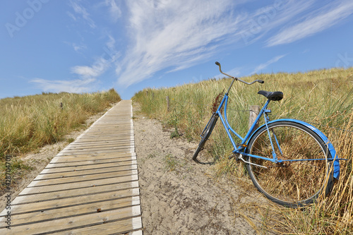 blue bicycle on the beach