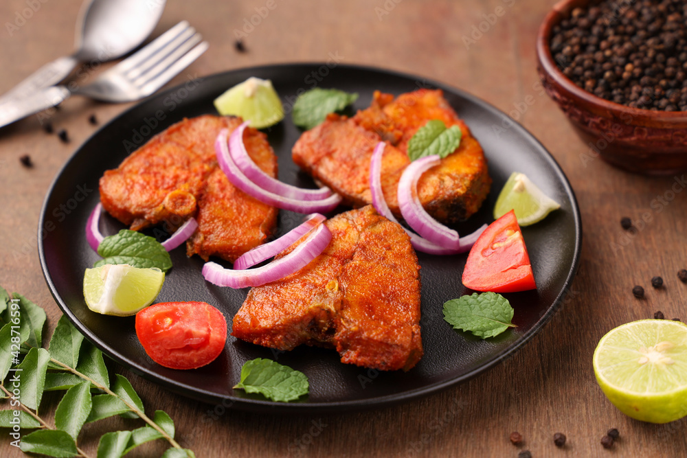 Fried fish, Kerala Fish fry in coconut oil India. Top view of fresh