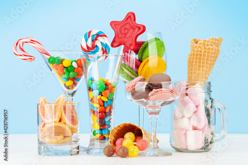 Various sweets in cocktail glasses