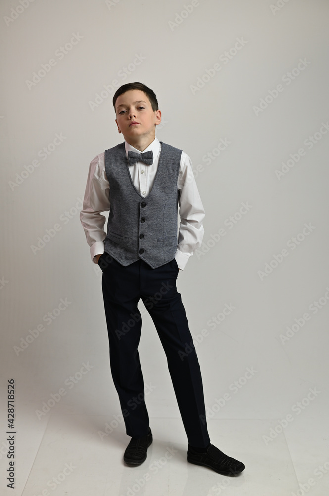 Full-length portrait of an artistic Caucasian teenager on a white background Full-length portrait of an artistic Caucasian teenager on a white background