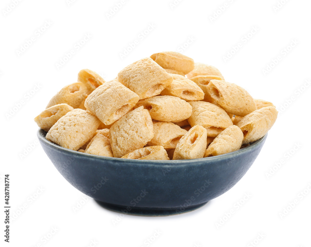 Bowl with tasty corn pillows on white background Bowl with tasty corn pillows on white background