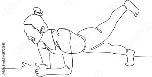Fit woman doing yoga plank