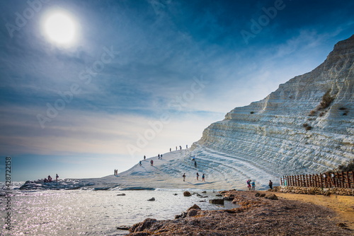 Sun and hazy sky at Scala dei Turchi, Agrigento. Sicily  photo