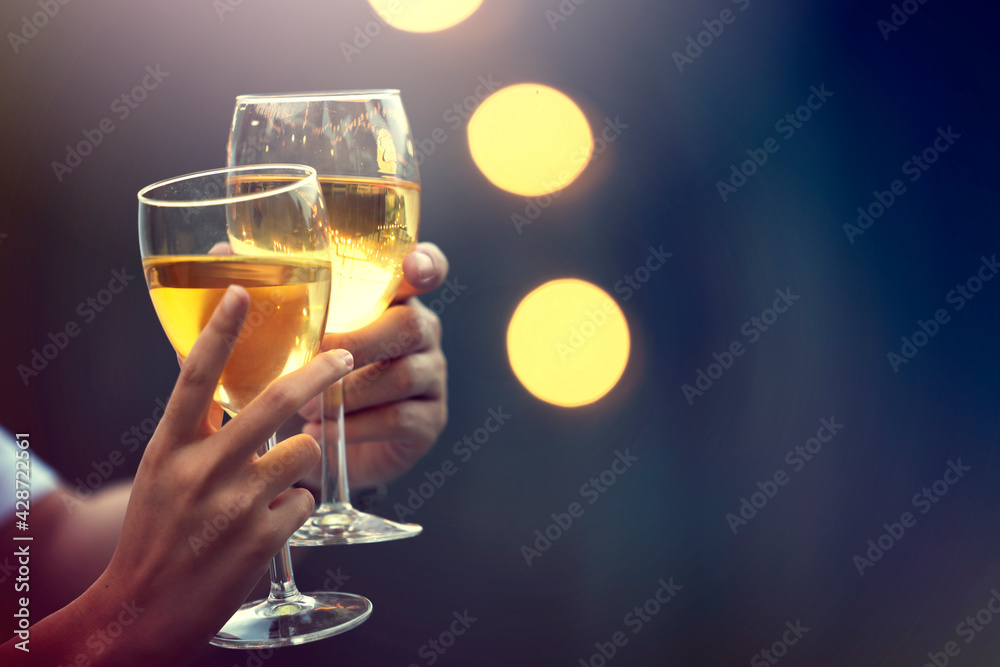 Party time start. Happy people toasting with champagne flutes. Multiethnic friends congratulating each other with new year. Celebration holiday concept, holiday background. selective focus Party time start. Happy people toasting with champagne flutes. Multiethnic friends congratulating each other with new year. Celebration holiday concept, holiday background. selective focus