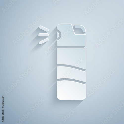 Paper cut Pepper spray icon isolated on grey background. OC gas. Capsicum self defense aerosol. Paper art style. Vector