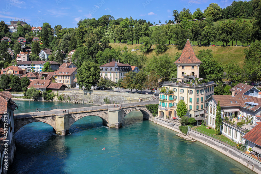 Bern, Switzerland - August 18. 2013: Old town of Bern from the Mydegg Bridge over the Untertor bridge and the Aare river