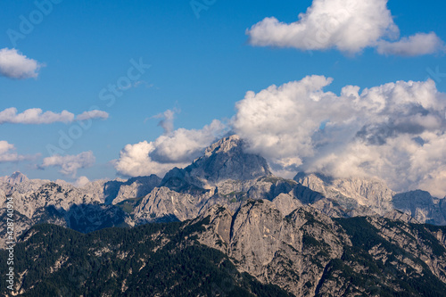 Mountain Range and the peak of the Mount Mangart  2677 m.  seen from the small village of Lussari  Julian Alps  Tarvisio  Udine province  Friuli Venezia Giulia  Italy  Europe.