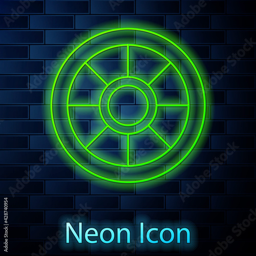 Glowing neon line Safe icon isolated on brick wall background. The door safe a bank vault with a combination lock. Reliable Data Protection. Vector