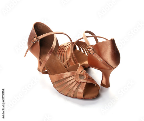 A pair of new women's ballroom dancing shoes isolated on a white background.