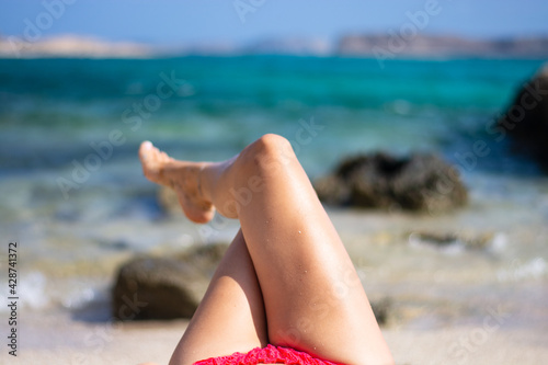 the girl in bikini in front of the sea © corradobarattaphotos