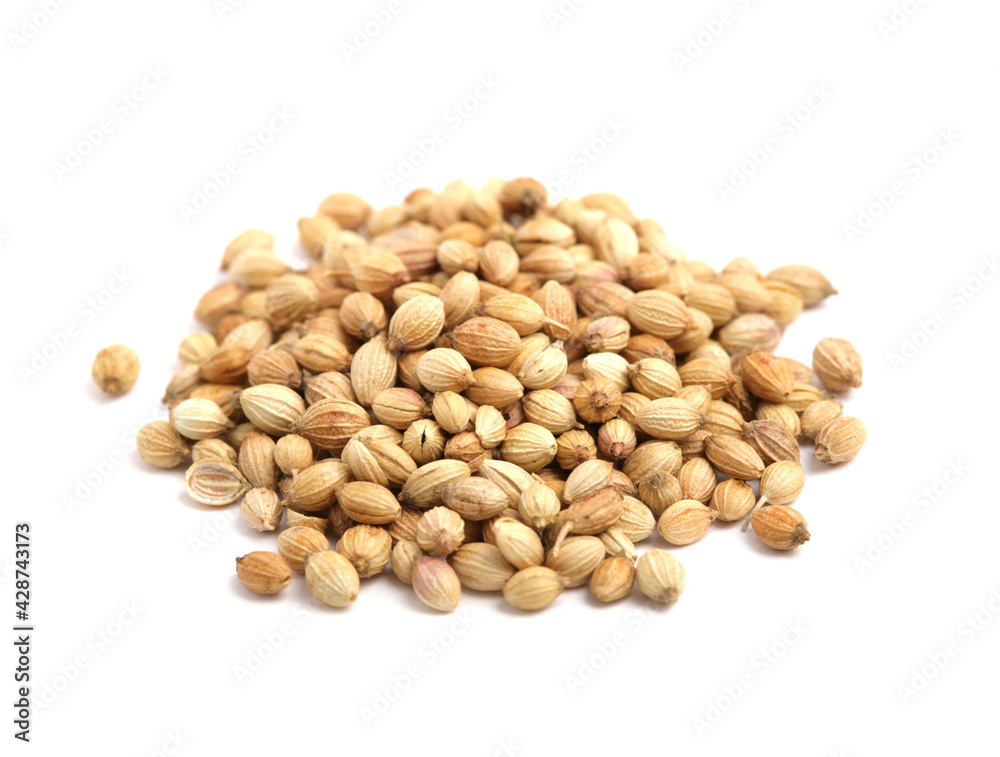 Coriander seeds isolated on on white background. A popular aromatic spice. Coriander seeds isolated on on white background. A popular aromatic spice.