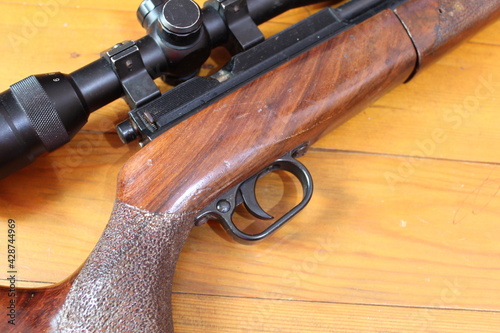 old gun on wood