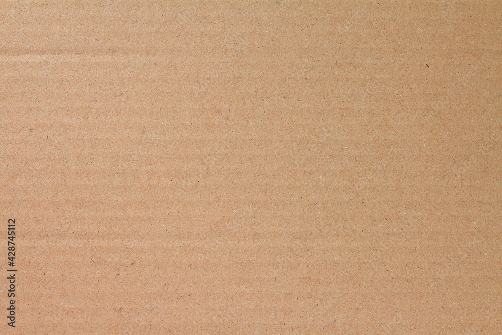 Cardboard sheet texture background, detail of recycle brown paper box pattern. Cardboard sheet texture background, detail of recycle brown paper box pattern.