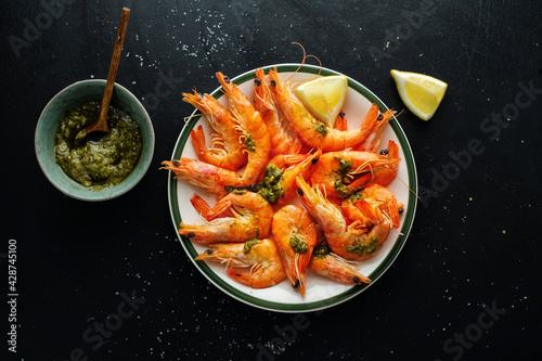 Shrimps with spices on plate