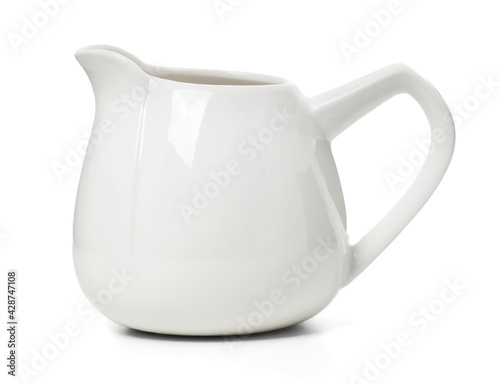 Porcelain sauce boat, pitcher, creamer or ceramic gravy boat isolated on withe