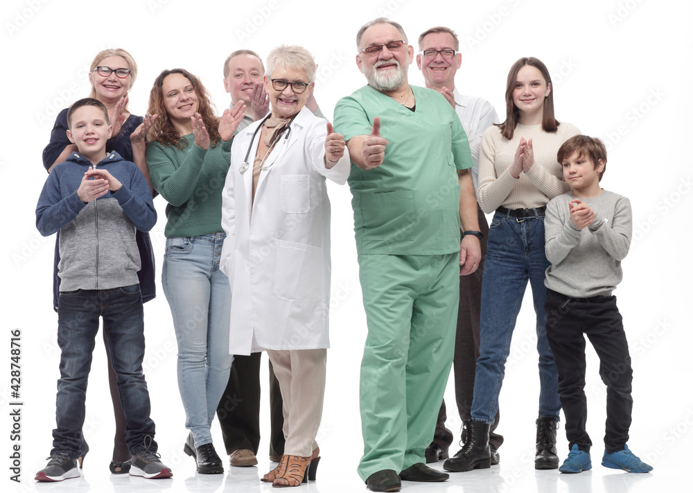 happy family and their family doctor standing together. happy family and their family doctor standing together.
