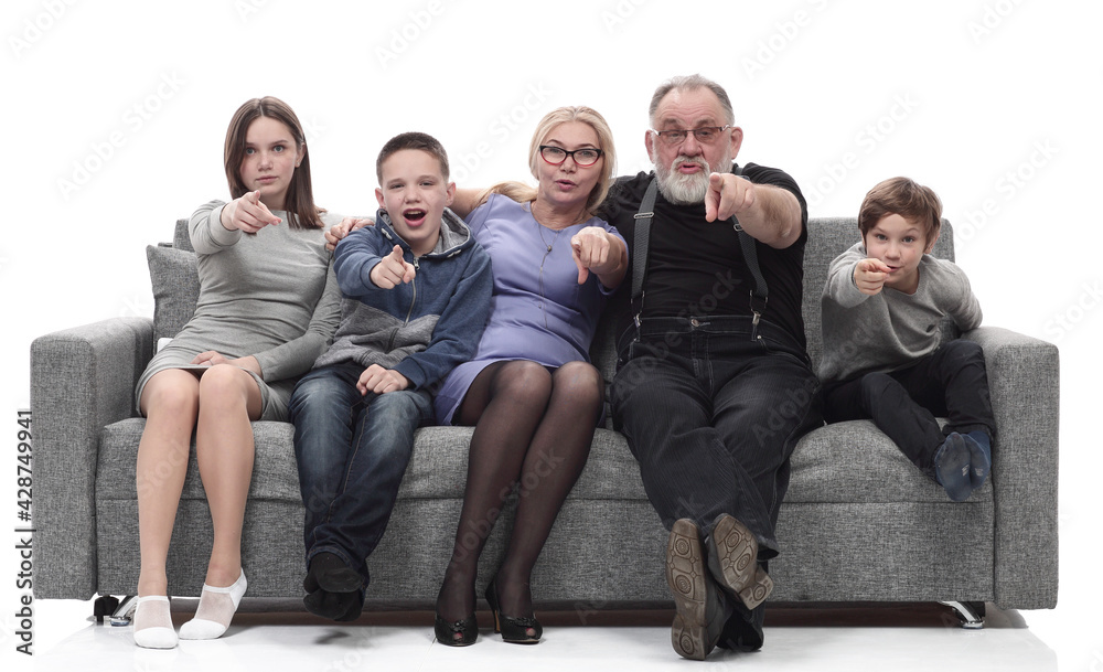 happy family sitting on a large comfortable sofa. happy family sitting on a large comfortable sofa.