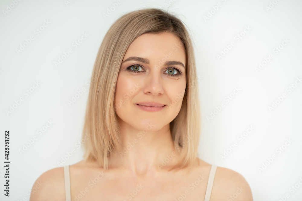 Beautiful calm middle aged woman, natural light. Anti-aging and beauty treatment. Beautiful calm middle aged woman, natural light. Anti-aging and beauty treatment.