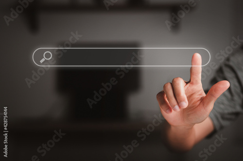 Fingers are pinned to an empty search bar, search engine concept, Search engine optimization, SEO
