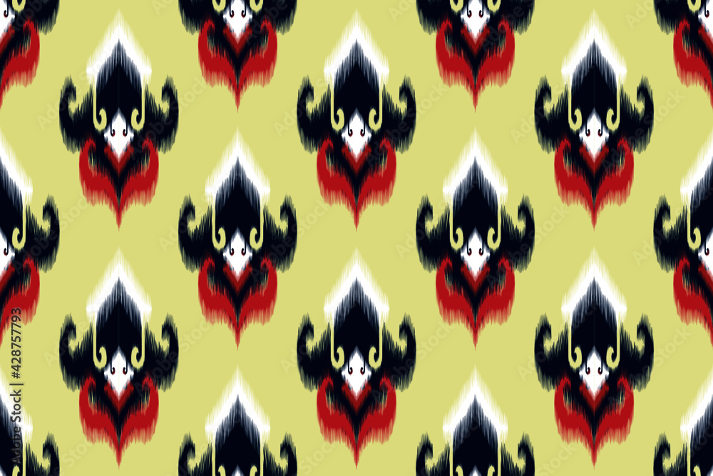 Ikat ethnic seamless pattern design for textile fabric. Indian boho African American carpet chevron wallpaper. Ikat ethnic seamless pattern design for textile fabric. Indian boho African American carpet chevron wallpaper.