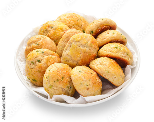 Steam buns with leeks and garlic, homemade pastries, freshly baked buns on a plate, isolated on a white background