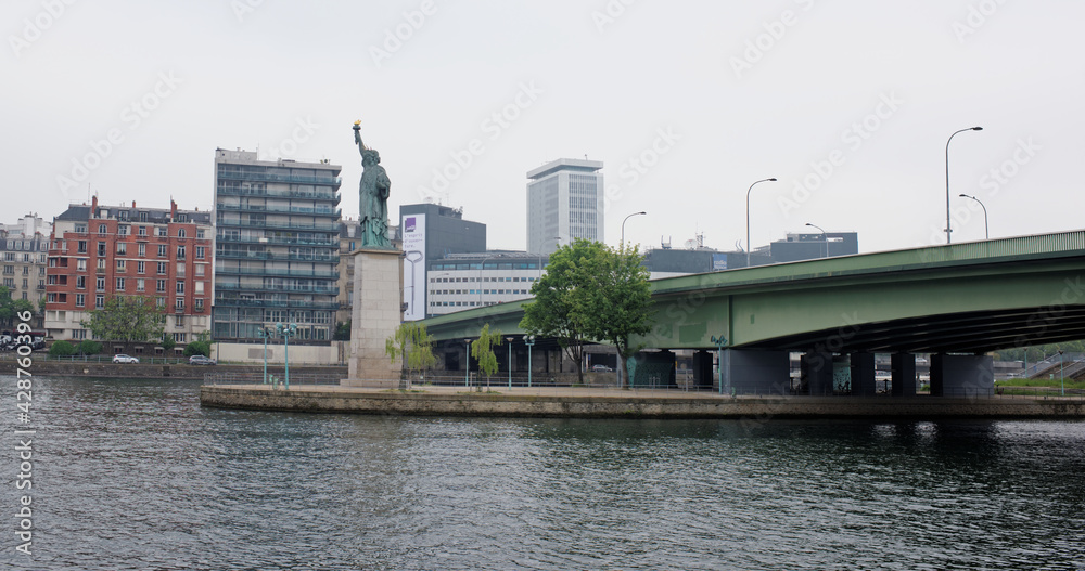  The swan island became a haven for a smaller Statue of Liberty. The copper lady, 11.5 meters high, peers at the distant shores of the American continent