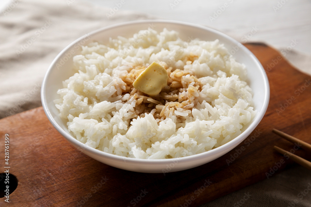 Homemade Japanese Butter Sauce Rice, side view. Close-up. Homemade Japanese Butter Sauce Rice, side view. Close-up.