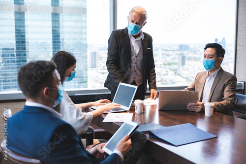 person wearing surgical fac...