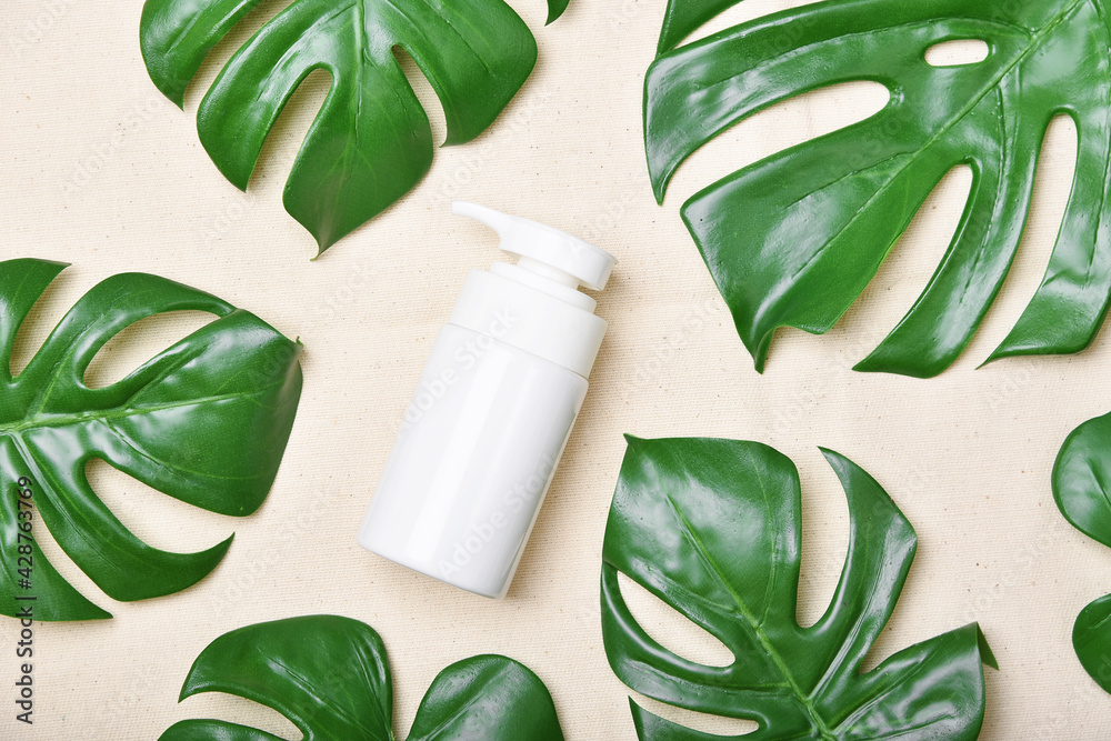 Natural skincare beauty product, Cosmetic bottle containers packaging with green nature leaves, Blank label for organic spa branding mock-up,Herbal healthy skin care. Natural skincare beauty product, Cosmetic bottle containers packaging with green nature leaves, Blank label for organic spa branding mock-up,Herbal healthy skin care.