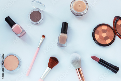 Makeup cosmetic products on white background. Top view, flat lay. Fashion, beauty concept