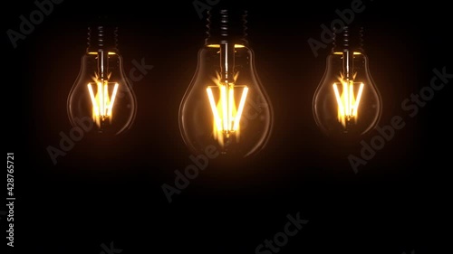 Switching on, turning off light bulbs animation. Yellow light over dark black background. Bright glowing and flickering Edison, Tungsten lamp. Retro vintage lamp shapes or form. 3D Render 4K animation