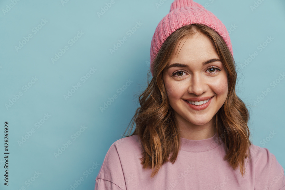 Young happy woman smiling and posing at camera Young happy woman smiling and posing at camera