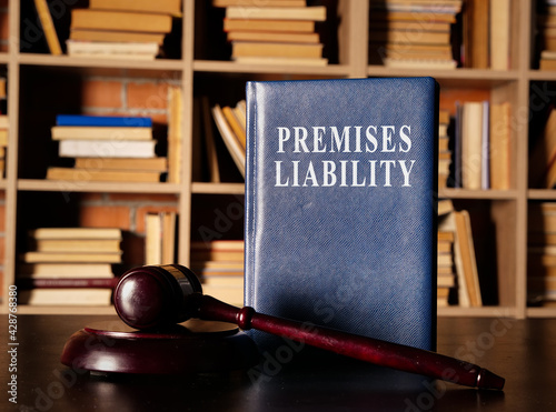 Foto Premises Liability book with a court hummer.