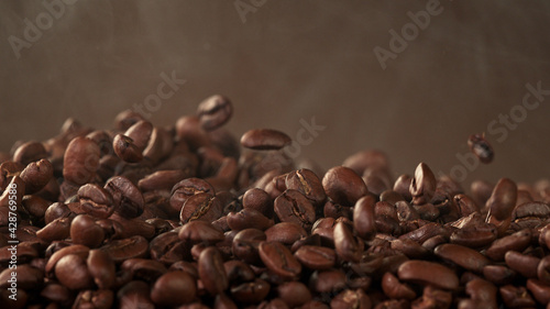 Falling roasted coffee beans