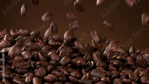 Falling roasted coffee beans